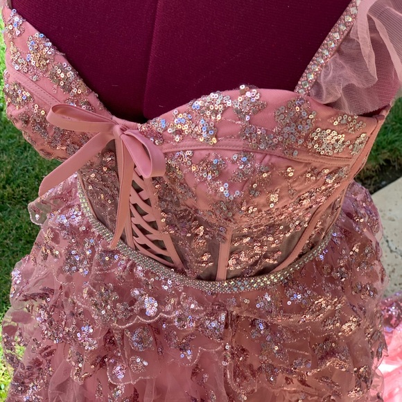 Glitter Mesh Corset Tiered Ballgown with Sequin and Ruffle Detail.
Prom dress. - Picture 15 of 17